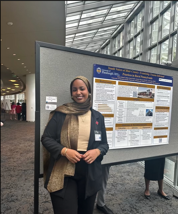 Student with her poster at CDC