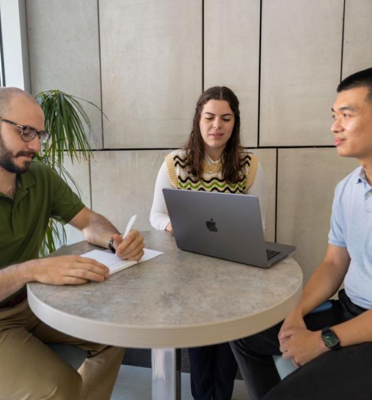 group work around a computer