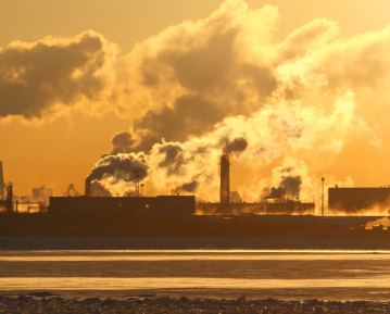 industrial site with smokestacks