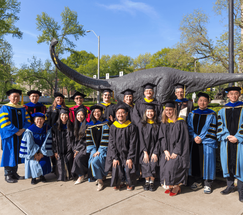 2024 graduates and faculty outside Carnegie Music Hall