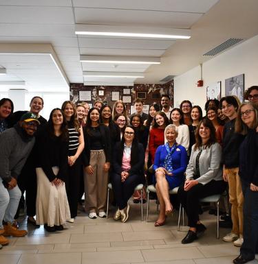 Students, Faculty, and Staff smiling for the BSPH Spring 2025 Capstone Symposium