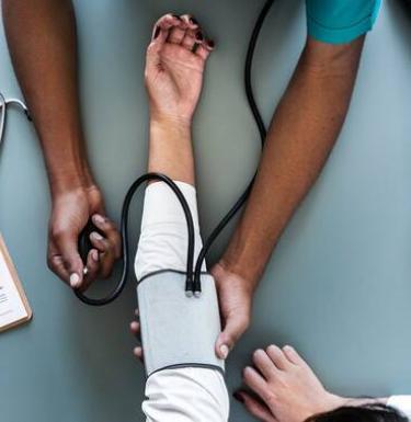 patient having vitals taken 