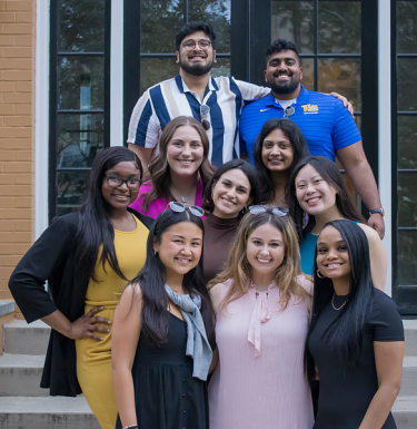 featured students posing in a group