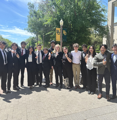 students posing outside 