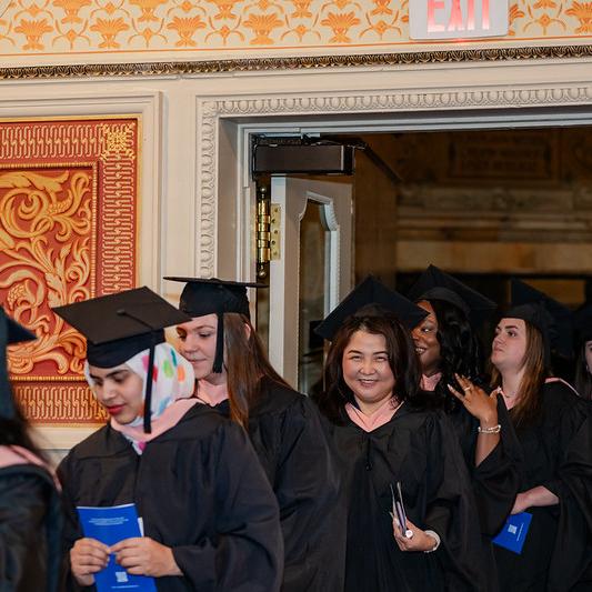 students in line at graduation