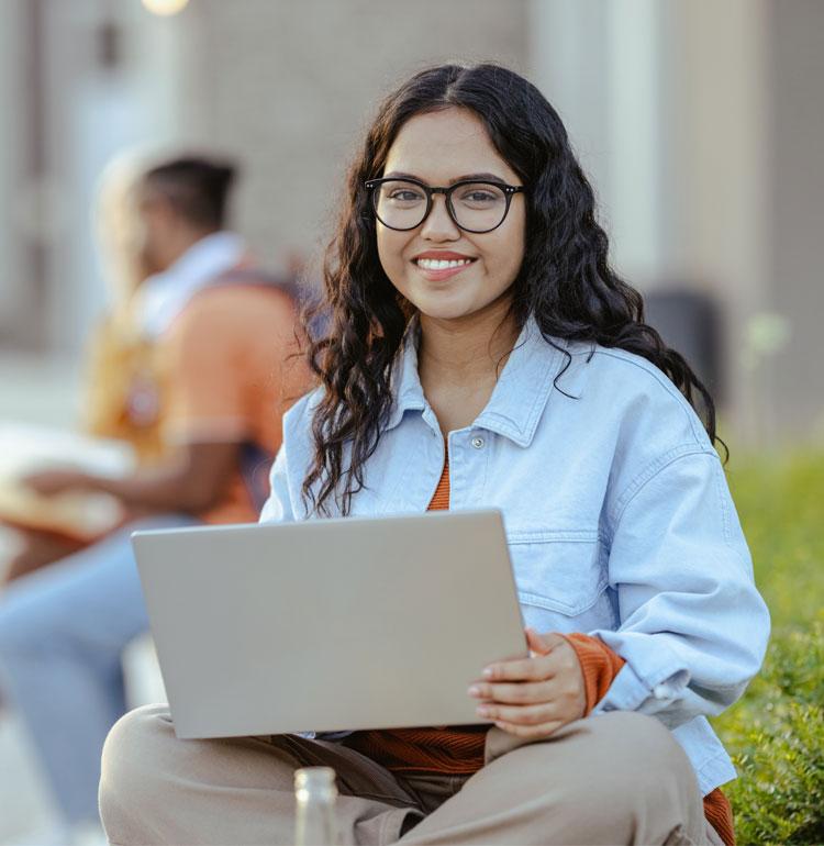 Woman smiling with laptop