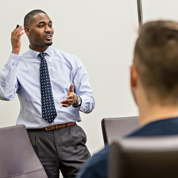 Professor talking to students